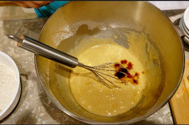 bowl with cake mix and vanialla