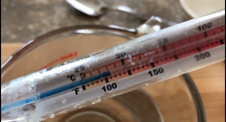 A Cup and thermometer
