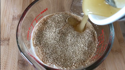 Adding honey to yeast mixture