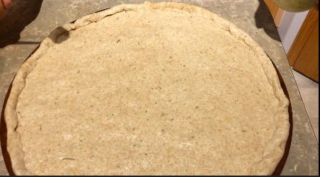 pizza dough on pizza stone