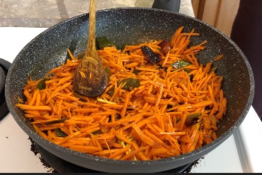 sauteed carrot in a pan